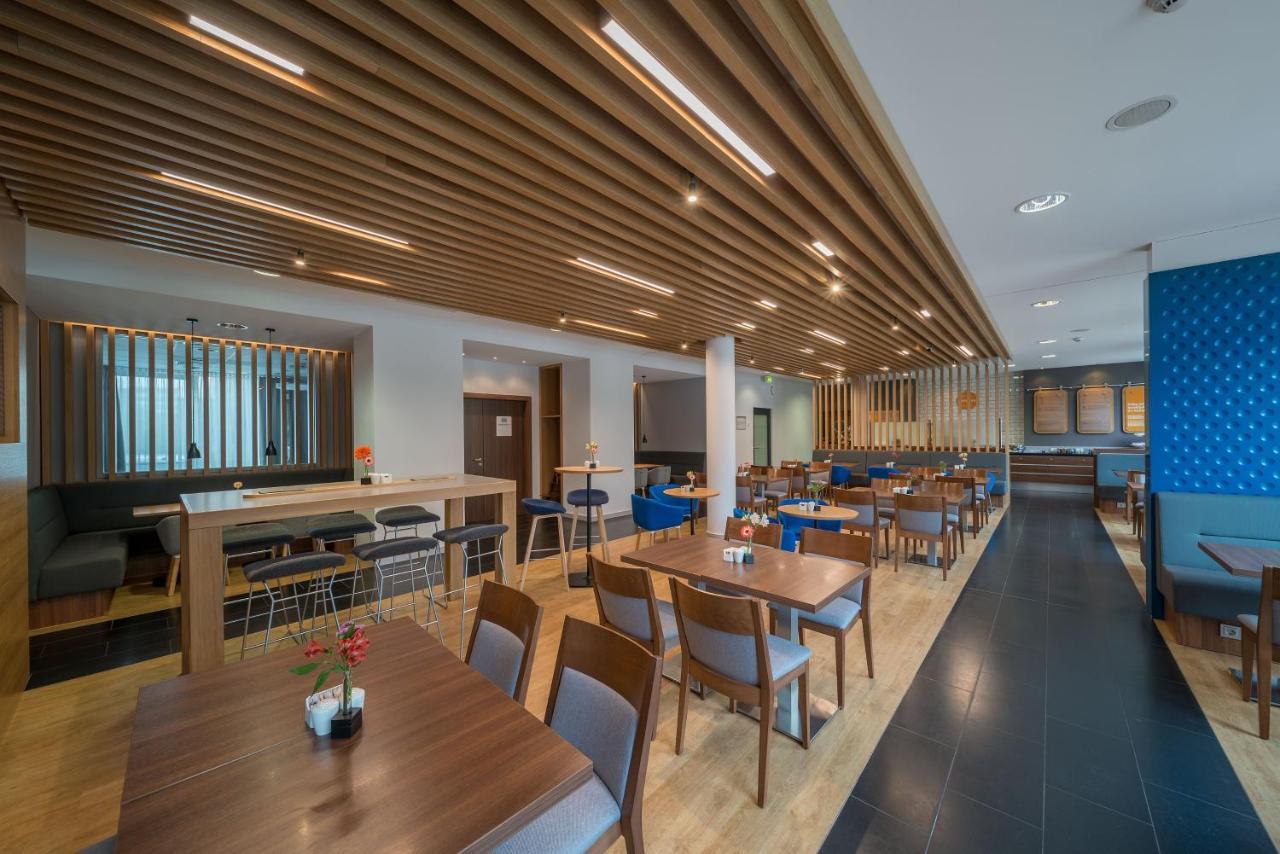 Holiday Inn Express Stuttgart Airport, An Ihg Hotel لينفلدن اشتردين المظهر الخارجي الصورة
